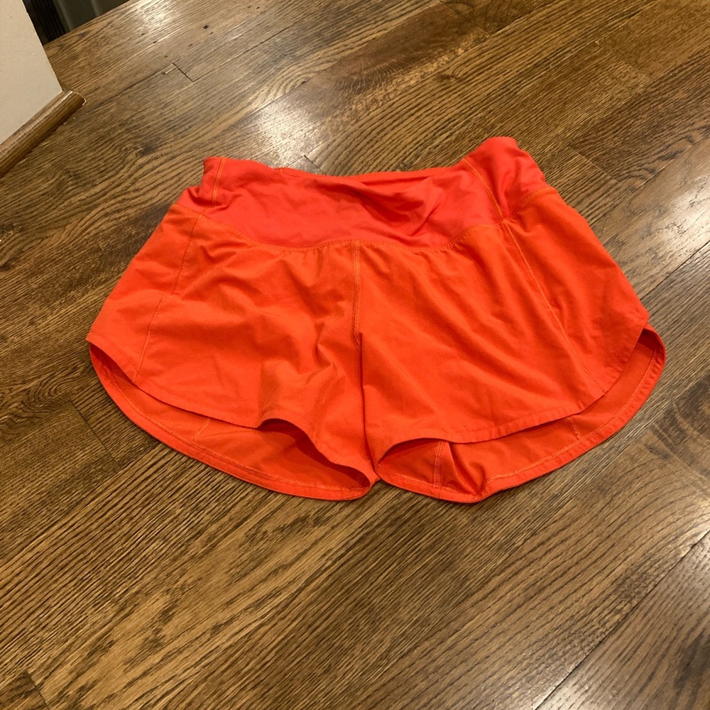 Lululemon size 4 orange speed ups